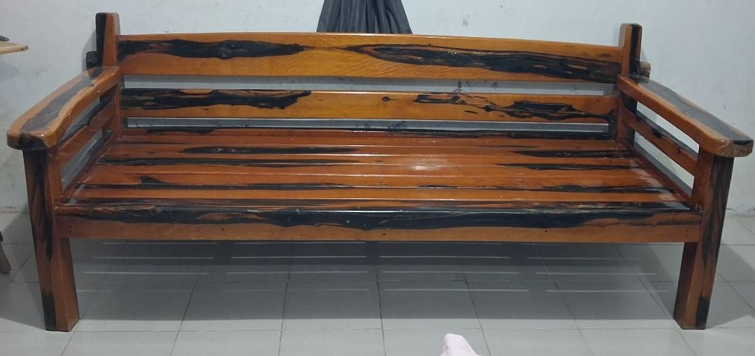 Kamagong Wooden Bench (Category: Chairs) located in Quezon City. Submitted by jac20 (Listing ID 1429132932, Image 2). Description: Kamagong Wooden Bench Beautifully crafted from premium kamagong wood, this bench is built to last and designed to stand out. Known for its natural strength and rich dark grain, kamagong gives this piece a timeless, elegant look. • Sturdy and durable construction • Can be easily disassembled for transport or storage • 