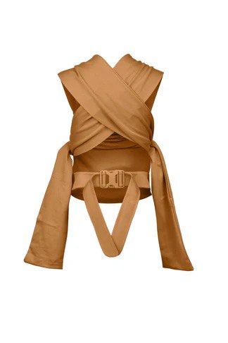 Lalabu Simple Wrap - Camel (Category: Carriers & Slings) located in Taguig. Submitted by krinx_tayao (Listing ID 1428999725, Image 2). Description: Never used as I was gifted several carriers. Brand is international. Original Price : 99usd + shipping cost Soft like a traditional wrap, structured like a carrier—without the bulk or confusion. Just clip, slip on, tuck in your baby, and go. Designed for babies 13–28 lbs and recognized as hip-healthy 