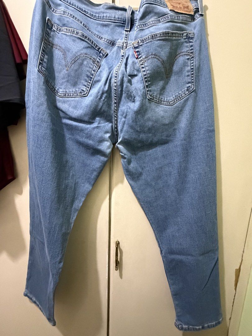Levi's Boyfriend Jeans Size 32 (Category: Jeans) located in San Juan City. Submitted by eiaprelovedsj (Listing ID 1429055417, Image 3). Description: Authentic Levi's boyfriend jeans in a light blue wash. Features a classic five-pocket design with the Levi's logo patch on the back. The jeans have a straight leg cut. Size 32. Perfect for everyday wear..