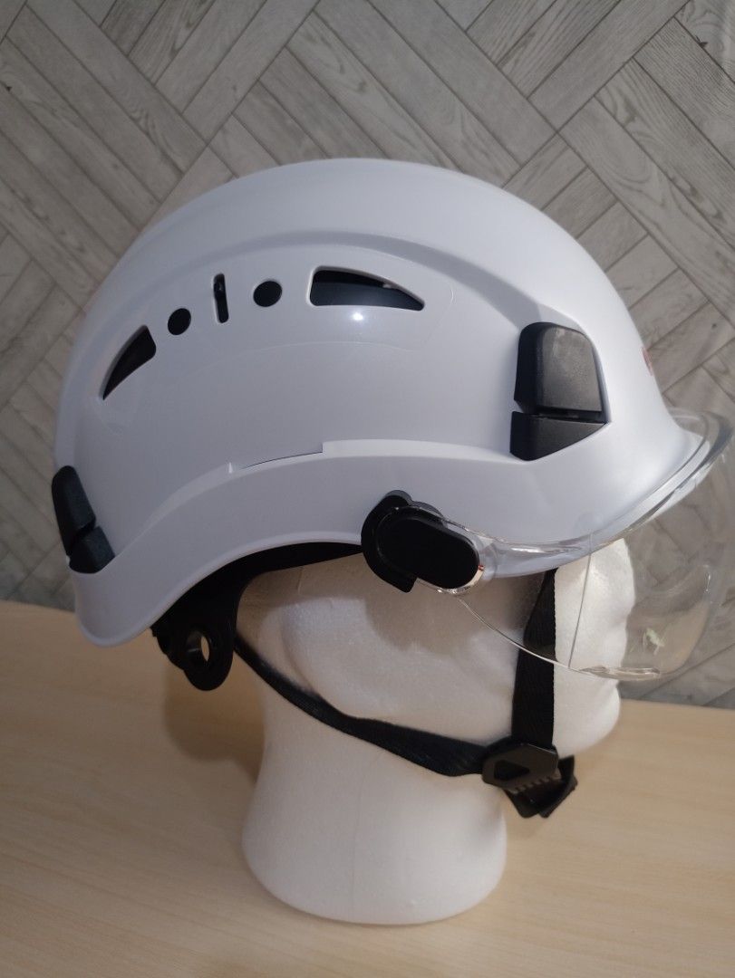 Logbuck Safety Helmet with Visor (Category: Construction Tools & Equipment) located in Calamba. Submitted by ashleyabags (Listing ID 1429050260, Image 2). Description: Logbuck safety helmet features a clear visor and adjustable straps for a secure fit. It has a high-impact ABS shell and is designed to be waterproof and breathable. The helmet includes air vents for ventilation. The design also includes a chin strap for added safety. The helmet is 