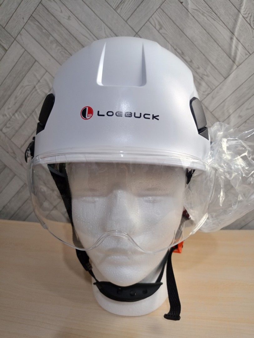 Logbuck Safety Helmet with Visor (Category: Construction Tools & Equipment) located in Calamba. Submitted by ashleyabags (Listing ID 1429050260, Image 3). Description: Logbuck safety helmet features a clear visor and adjustable straps for a secure fit. It has a high-impact ABS shell and is designed to be waterproof and breathable. The helmet includes air vents for ventilation. The design also includes a chin strap for added safety. The helmet is 