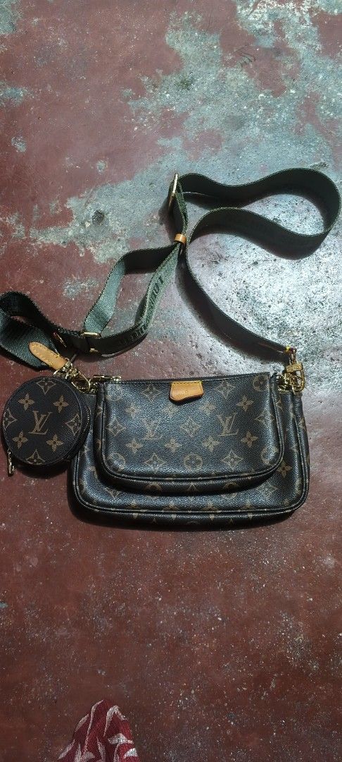 Louis Vuitton Multi Pochette Accessoires (Category: Luxury Bags & Wallets) located in Manila. Submitted by thriftnijuls (Listing ID 1429023978, Image 1). Description: Louis Vuitton Multi Pochette Accessoires. Features the iconic monogram canvas. Includes a detachable round coin purse and adjustable shoulder strap. The interior tag reads "LOUIS VUITTON PARIS MADE IN FRANCE". The zipper has the LV logo. Serial number is visible. A stylish and versa