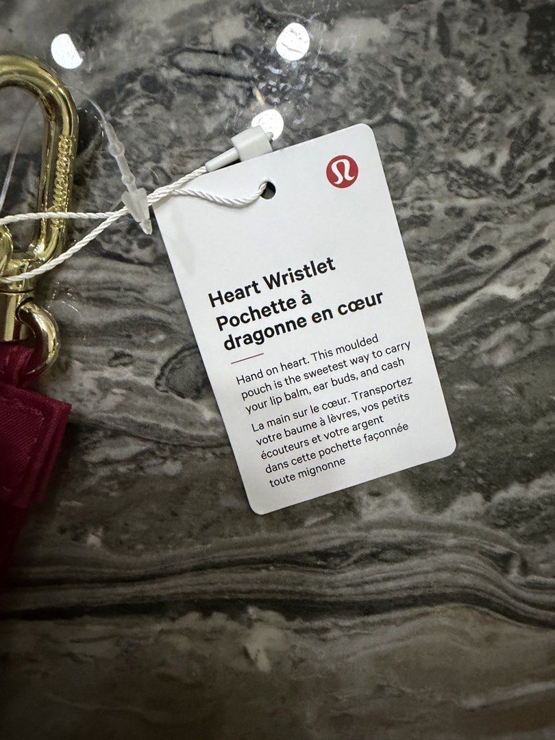 Lululemon Heart Wristlet (Category: Wallets & Card holders) located in Makati City. Submitted by marialin21 (Listing ID 1429118525, Image 2). Description: Lululemon Heart Bag from Japan.