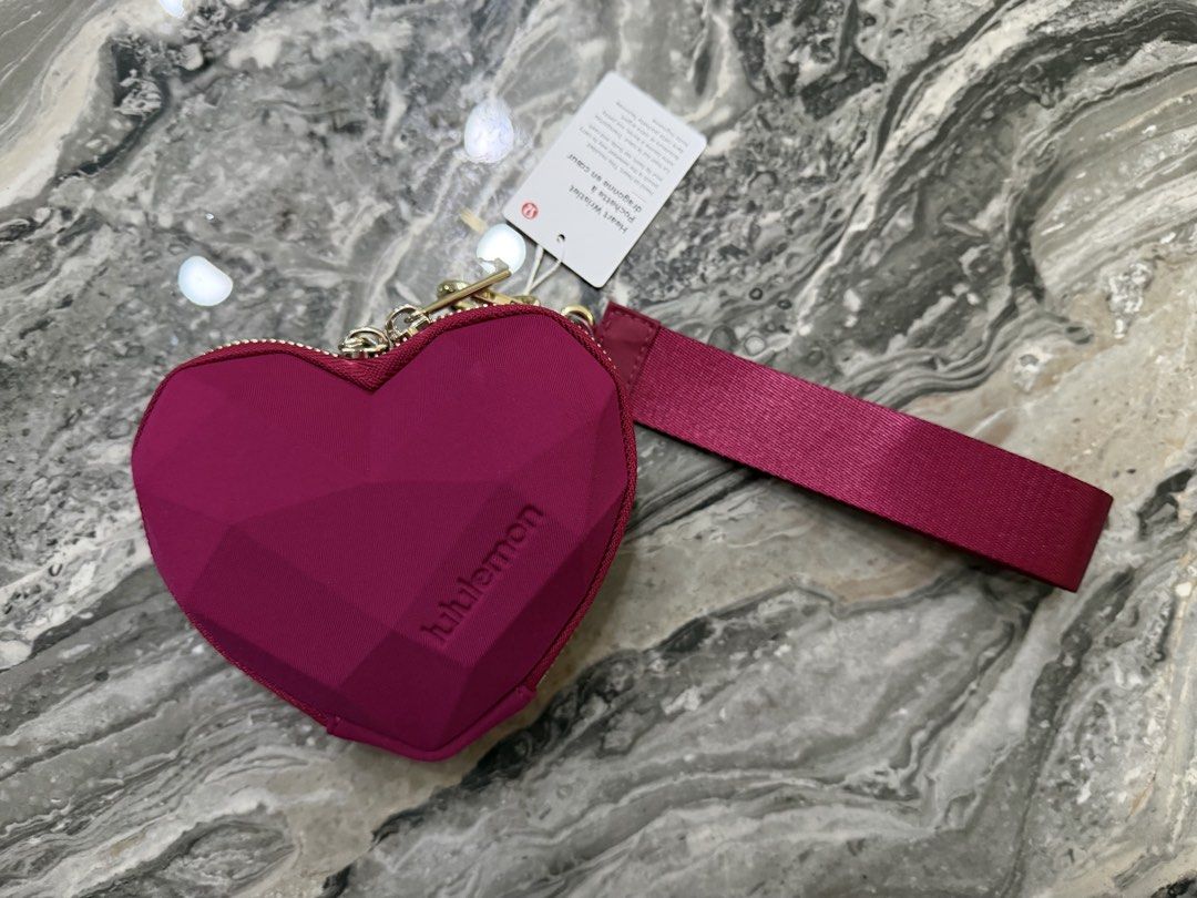 Lululemon Heart Wristlet (Category: Wallets & Card holders) located in Makati City. Submitted by marialin21 (Listing ID 1429118525, Image 1). Description: Lululemon Heart Bag from Japan.