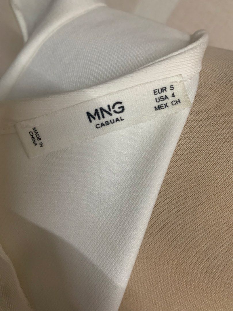 Mango Casual White Ruffle Sleeve Dress (Category: Dresses) located in Quezon City. Submitted by thriftythought (Listing ID 1429052865, Image 2). Description: Decluttering Loc QC .