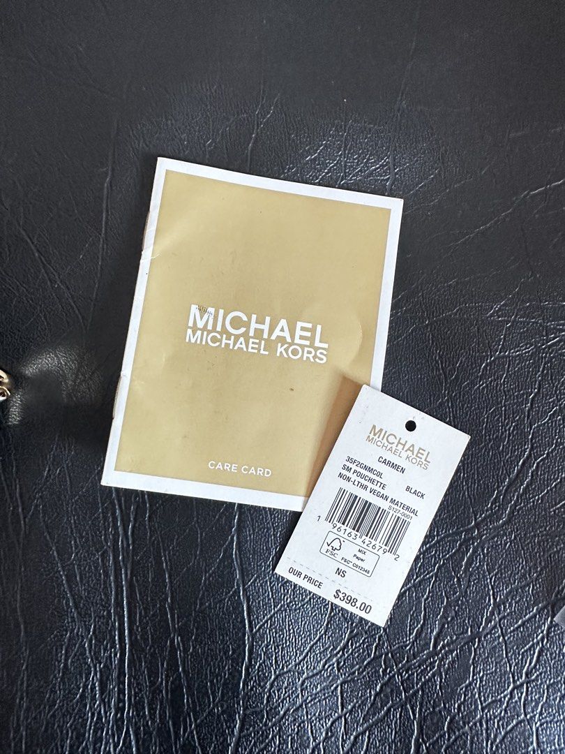 Michael Kors Carmen SM Pouchette Black (Category: Luxury Bags & Wallets) located in Paranaque City. Submitted by onlinerummage (Listing ID 1429012679, Image 3). Description: No issues, 100% Authentic.