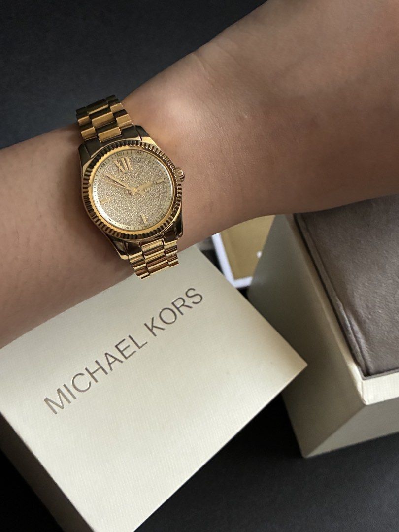 Michael Kors Gold Watch MK3691 (Category: Women's Watches) located in Quezon City. Submitted by yes7ha (Listing ID 1429027965, Image 1). Description: Specs: • Brand: MK3691 • Color: Gold • Material: Stainless steel / gold finish • Origin: Dubai • Type: Analog wristwatch • Fits standard wrist sizes Condition: • Barely used • Fully functional Inclusions: • Watch, Box, and Manual Other Details: • Original MK3691 • Sleek and classy design, suitable f
