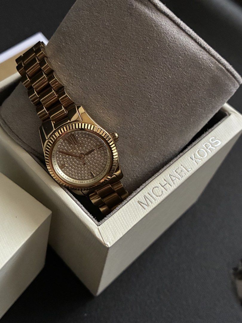 Michael Kors Gold Watch MK3691 (Category: Women's Watches) located in Quezon City. Submitted by yes7ha (Listing ID 1429027965, Image 2). Description: Specs: • Brand: MK3691 • Color: Gold • Material: Stainless steel / gold finish • Origin: Dubai • Type: Analog wristwatch • Fits standard wrist sizes Condition: • Barely used • Fully functional Inclusions: • Watch, Box, and Manual Other Details: • Original MK3691 • Sleek and classy design, suitable f