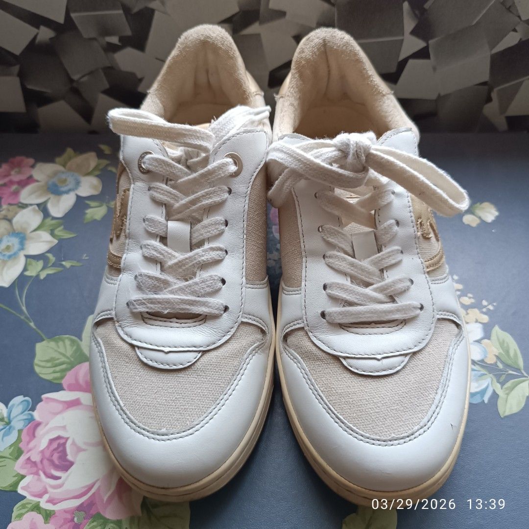 Michael Kors Sneakers (Category: Sneakers) located in Bacoor. Submitted by pamelott (Listing ID 1429034021, Image 3). Description: Brand: Michael Kors ​Style: Low-top fashion sneakers (court style) ​Colorway: Cream, white, and gold ​Materials: A multi-textured mix of smooth leather overlays, canvas or textile side panels, and metallic accents. Sold as is, pls. manage your exectations Flaws on ohotos.