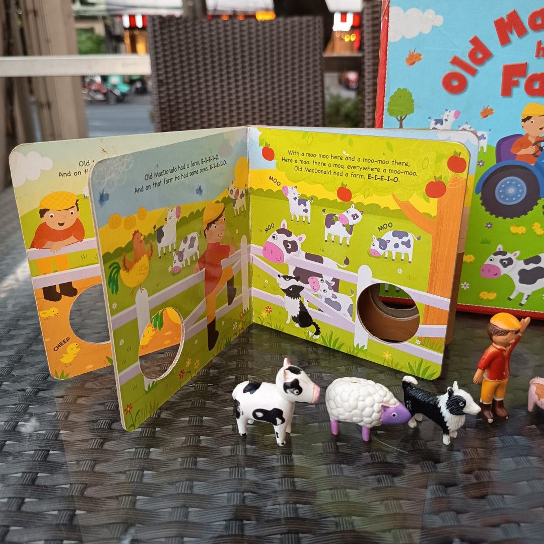 Old MacDonald had a Farm Book & Playset (Category: Children's Books) located in Pasig City. Submitted by wafflestore (Listing ID 1429023084, Image 3). Description: Includes: - Illustrated hardbound book, missing sound button - Toy set: Farmer, Tractor, Dog, Pig, Cow, Sheep - Box w/ latch Payment through GCash..