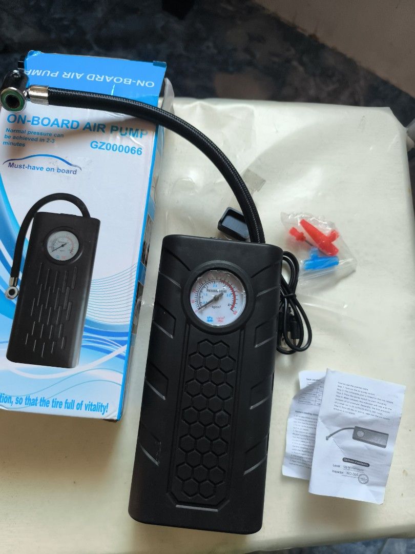 On-Board Air Pump GZ000066 (Category: Home Improvement Tools & Accessories) located in Cavite. Submitted by Combiishop (Listing ID 1428999360, Image 1). Description: On-Board Air Pump is a must-have for your car. It comes with an air hose, additional nozzles, and a power cable. The pump has a built-in pressure gauge. The item is in its original box with the manual included..