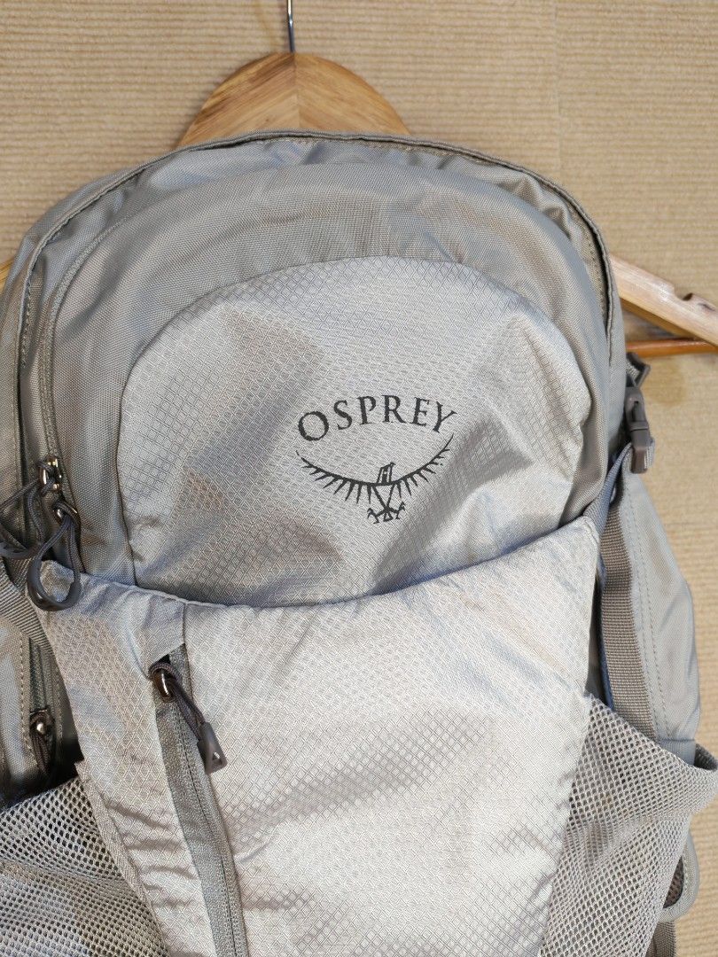 Osprey Daylight plus Backpack (Category: Backpacks) located in Iligan City. Submitted by wantwears14 (Listing ID 1429137533, Image 2). Description: Osprey backpack is a lightweight and versatile option. It features a main compartment, front zippered pocket, and side mesh pockets. The back panel has a breathable design for comfort. The Osprey logo is visible on the front. It also has adjustable straps and a sternum strap for a secure fit. The back
