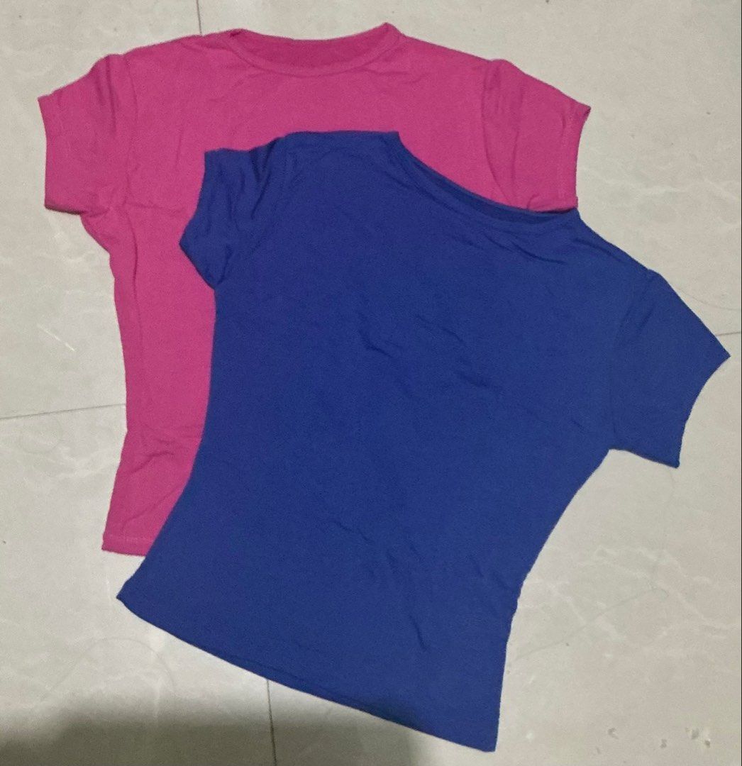 Pink and Blue Crew Neck T-shirts (Category: Shirts) located in Manila. Submitted by laracqll (Listing ID 1429045793, Image 1). Description: take all! stretchy fabric rfs: decluttering.