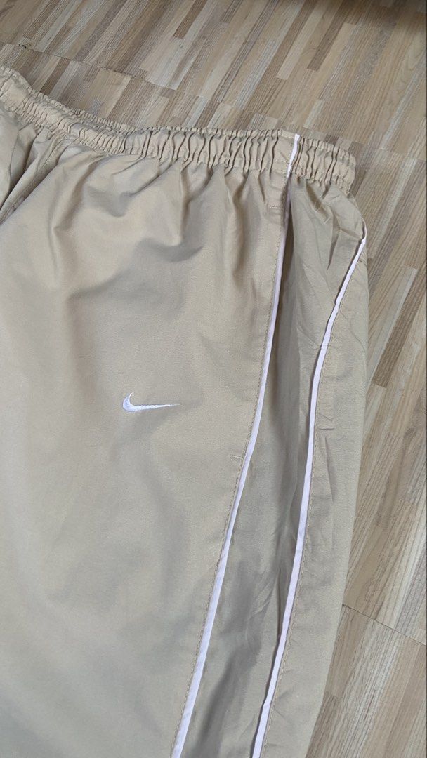 Rare Early 2000's Beige Double Lining Nike Trackpants (Category: Activewear) located in Taguig. Submitted by trvp. (Listing ID 1429133930, Image 2). Description: Rare Early 2000's Beige Double Lining Nike Trackpants Waist: 28" to 36" Length: 41" Leg Opening: 9" No Issue/As new Condition Taguig City can do vc/vouch for safety.