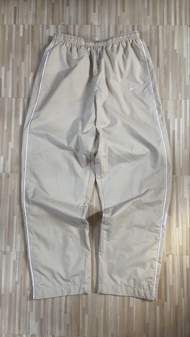 Rare Early 2000's Beige Double Lining Nike Trackpants (Category: Activewear) located in Taguig. Submitted by trvp. (Listing ID 1429133930, Image 1). Description: Rare Early 2000's Beige Double Lining Nike Trackpants Waist: 28" to 36" Length: 41" Leg Opening: 9" No Issue/As new Condition Taguig City can do vc/vouch for safety.