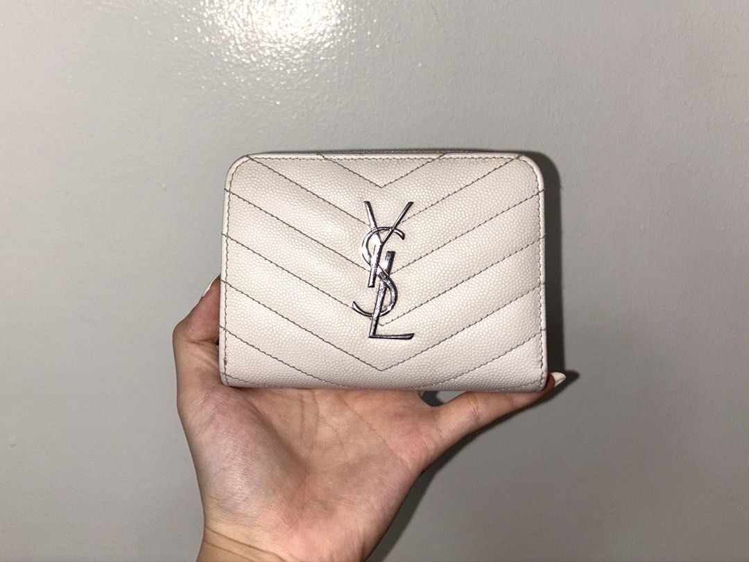 Saint Laurent Monogram Quilted Bifold Wallet (Category: Luxury Bags & Wallets) located in Quezon City. Submitted by nfdcloset (Listing ID 1429028030, Image 2). Description: Selling for my sister 🌸 - 100% authentic - Inclusions: box, dust bag, and authenticity cards - Multiple card slots and cash compartment + coin compartment - PRICE IS NEGOTIABLE - RFS: need funds -📍: QC - 📦: grab/lalamove is shouldered by buyer.