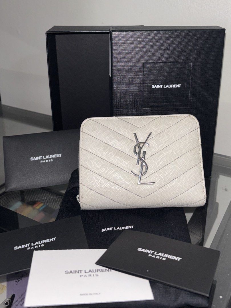 Saint Laurent Monogram Quilted Bifold Wallet (Category: Luxury Bags & Wallets) located in Quezon City. Submitted by nfdcloset (Listing ID 1429028030, Image 1). Description: Selling for my sister 🌸 - 100% authentic - Inclusions: box, dust bag, and authenticity cards - Multiple card slots and cash compartment + coin compartment - PRICE IS NEGOTIABLE - RFS: need funds -📍: QC - 📦: grab/lalamove is shouldered by buyer.