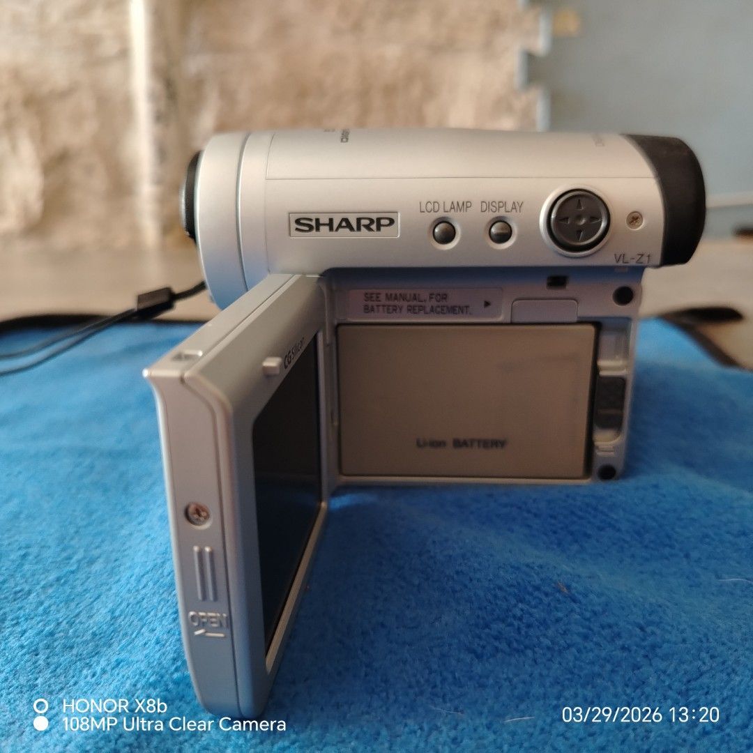 Sharp VL-Z1 Camcorder (Category: Cameras) located in Manila. Submitted by bren09 (Listing ID 1429033267, Image 2). Description: Sharp MiniDV Camcorder (Working, Blurry LCD, with charger) with exrta battery .