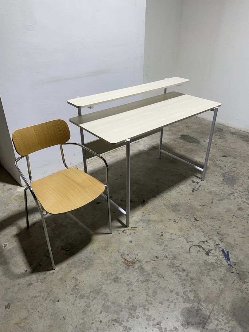 Study set (Category: Tables & Sets) located in Singapore. Submitted by oneseasons (Listing ID 1429129243, Image 3). Description: Study desk,MDF board with laminated finishing,dimensions,length 120cm,depth 55cm,height 75cm(big board),height 88cm,(small board);Study chair,metal frame with wooden seat and backrest,free delivery service. Available in 2 sets,2 sets price $110.