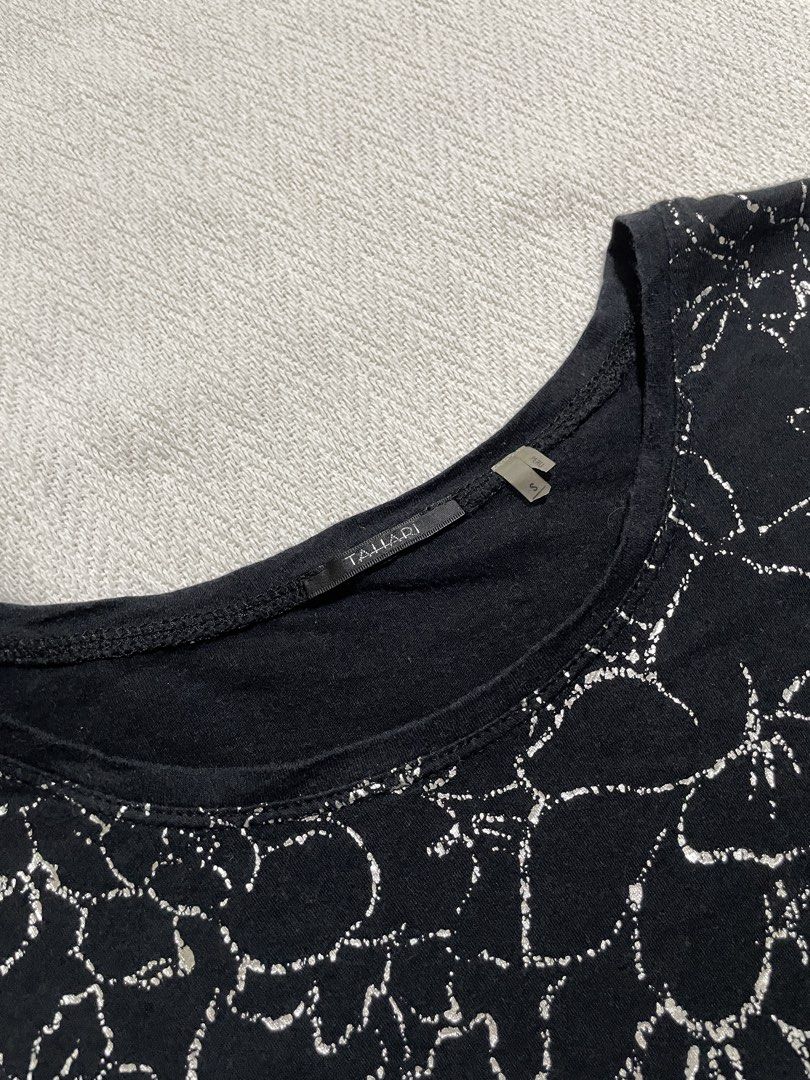 tahari black tee w/ silver floral graphics (Category: Shirts) located in Quezon City. Submitted by mossimoss (Listing ID 1429142601, Image 3). Description: chest 16 waist 14 length 24.5 [measured in inches laid flat] .