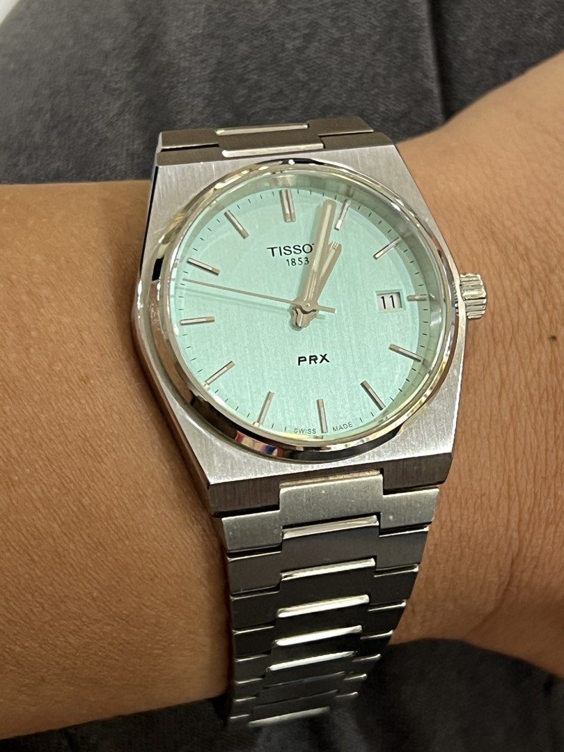 Tissot PRX 35mm “Tiffany” (Category: Luxury Watches) located in Pasig City. Submitted by itsmejaypee25 (Listing ID 1429040958, Image 1). Description: Tissot PRX 35mm Quartz Tiffany dial Complete set with box and manual RFS: seldom used Wears like a vintage Rolex Oysterdate.