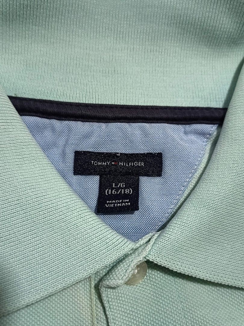 Tommy Hilfiger Polo Shirt (Category: Tshirts & Polo Shirts ) located in Quezon City. Submitted by ri_yaaa (Listing ID 1429098755, Image 2). Description: ‼️PLEASE READ BEFORE BUYING ‼️ This is a pre-loved item. The color of the product may vary due to lighting. RFS: • Decluttering • W18, L24 • Color: Mint green • Embroidered TH logo • Condition 10/10 • Color rate 10/10 MOP: Gcāsh MOD: Lalamove Location: Camarin, North Caloocan .