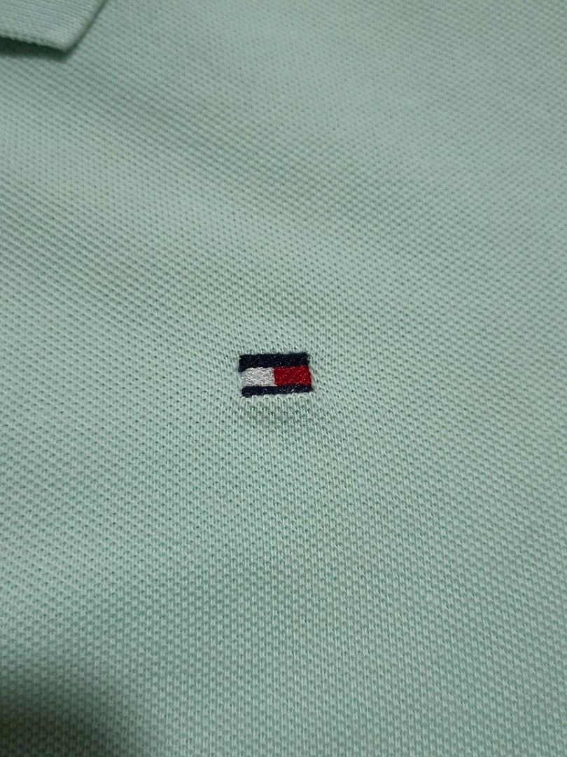Tommy Hilfiger Polo Shirt (Category: Tshirts & Polo Shirts ) located in Quezon City. Submitted by ri_yaaa (Listing ID 1429098755, Image 3). Description: ‼️PLEASE READ BEFORE BUYING ‼️ This is a pre-loved item. The color of the product may vary due to lighting. RFS: • Decluttering • W18, L24 • Color: Mint green • Embroidered TH logo • Condition 10/10 • Color rate 10/10 MOP: Gcāsh MOD: Lalamove Location: Camarin, North Caloocan .