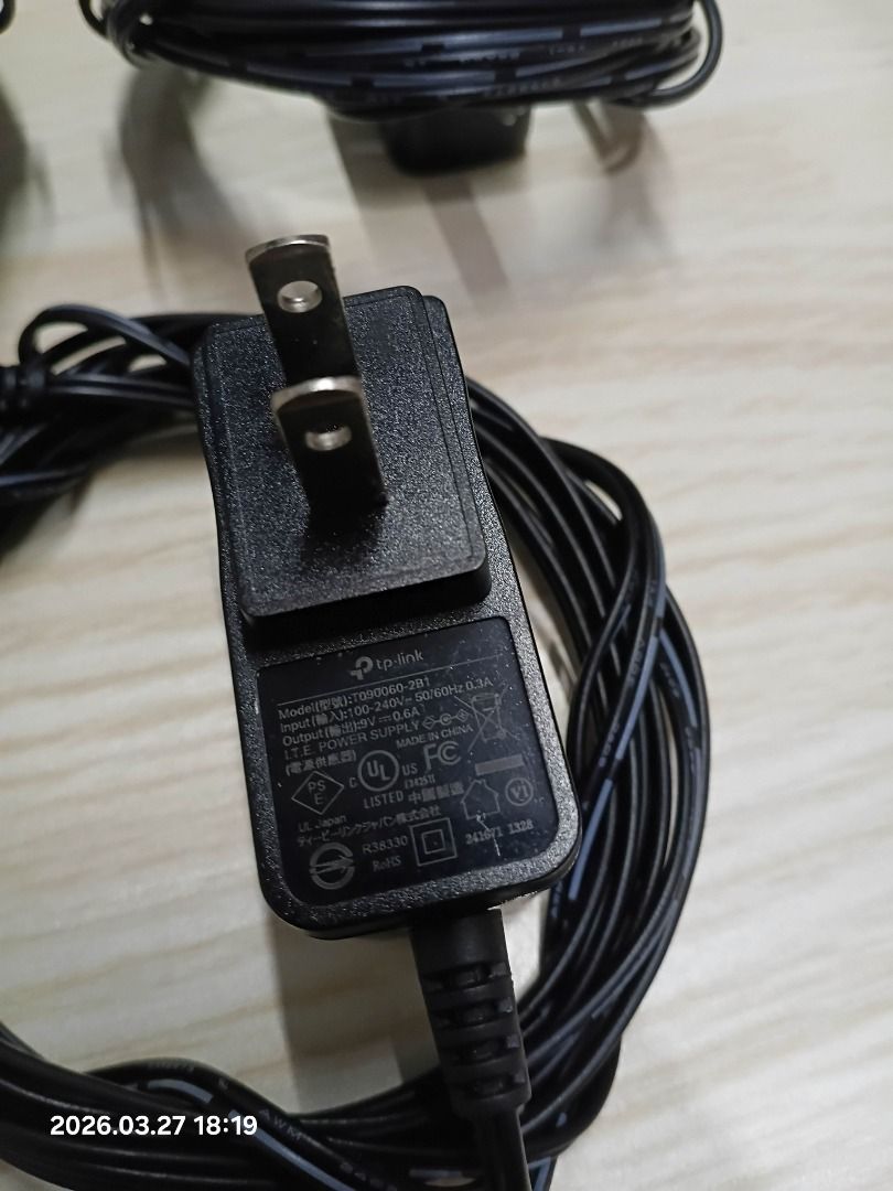 TP-Link Power Adapter (Category: Cables & Adaptors) located in Caloocan City. Submitted by abilisell (Listing ID 1429034280, Image 1). Description: TP-Link power adapter. Model: T090060-7B1. Input: 100-240V~50/60Hz 0.3A. Output: 9V 0.6A. Includes the power adapter and attached cable. Multiple units available. Perfect for replacing a lost or damaged adapter or as a spare. Compatible with various TP-Link devices..
