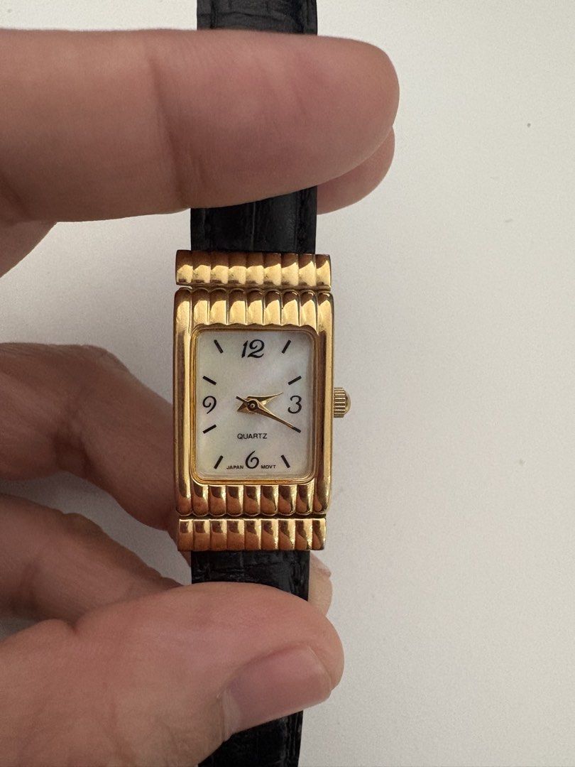 Vintage Avon Tank Watch (Category: Women's Watches) located in Murcia. Submitted by shansdecluttering (Listing ID 1429040475, Image 3). Description: Watch is fully functional with new batteries. Leather strap Mother of pearl face Quartz Japan Movement Watch bezel is in very good condition No scratches Thrifted in Japan.