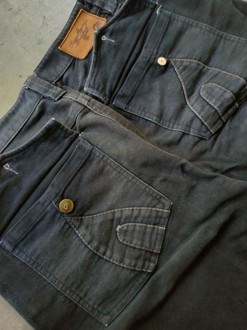 Vintage Oxygen Required Black Pants (Category: Jeans) located in Baguio. Submitted by pormado (Listing ID 1429106474, Image 3). Description: Stylish cargo pants from Oxygen Jeans OR. Features multiple pockets and a unique design. The pants have a button closure and a comfortable fit. Made from durable fabric, these pants are perfect for everyday wear. The size is indicated on the label. The pants have a distinctive design on the inner lining. Goo