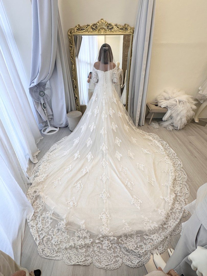 Wedding Gown adjustable 10 ft. train with beads and sequins 4 layers (Category: Evening dresses & gowns) located in Quezon City. Submitted by _anythingforless_ (Listing ID 1429106274, Image 1). Description: ‼️ PLS READ NEGOTIABLE FOR SURE BUYERS Selling my wedding gown Bought from Aurea Vinluan designs I used it only during the ceremony Fits small to medium frame Vacuum sealed already With free long veil Wedding gown is adjustable I am 5 ft and u