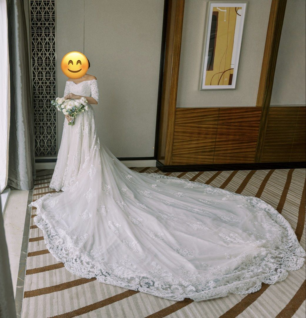 Wedding Gown adjustable 10 ft. train with beads and sequins 4 layers (Category: Evening dresses & gowns) located in Quezon City. Submitted by _anythingforless_ (Listing ID 1429106274, Image 3). Description: ‼️ PLS READ NEGOTIABLE FOR SURE BUYERS Selling my wedding gown Bought from Aurea Vinluan designs I used it only during the ceremony Fits small to medium frame Vacuum sealed already With free long veil Wedding gown is adjustable I am 5 ft and u