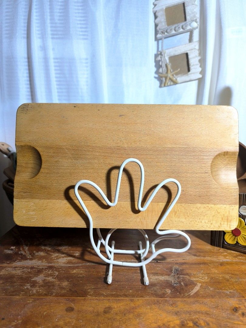 Wooden Cutting Board (Category: Knives & Chopping Boards) located in Pangil. Submitted by kopee_matcha (Listing ID 1429077944, Image 3). Description: Wooden cutting board is perfect for everyday kitchen use. It features a rectangular shape with rounded edges and a natural wood finish. The board has a handle on one side for easy carrying and storage. It's a practical and stylish addition to any kitchen..