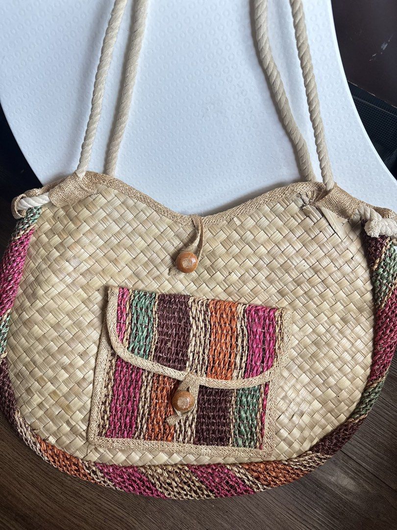 Woven Handbag with Colorful Pocket (Category: Tote Bags) located in Mandaluyong City. Submitted by TheWeekendProject (Listing ID 1429158485, Image 2). Description: - Woven banig shoulder bag - Features a colorful pocket - Made in the Philippines - Unique and stylish design - Perfect beach bag with roomy interior..