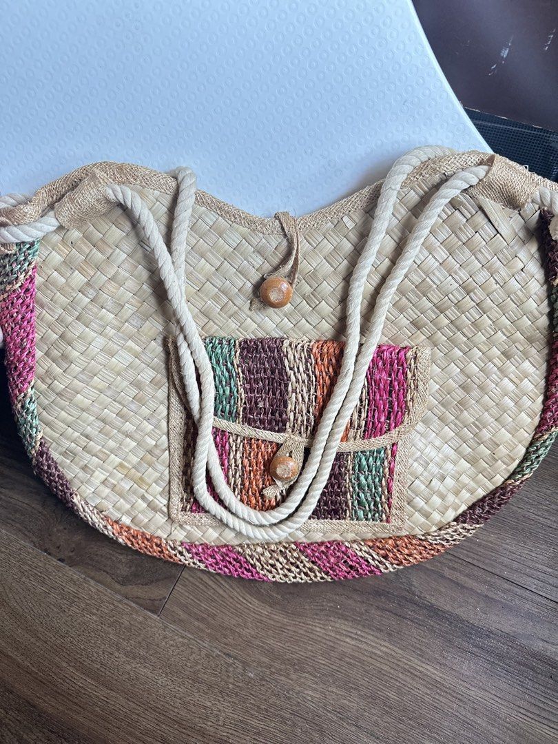 Woven Handbag with Colorful Pocket (Category: Tote Bags) located in Mandaluyong City. Submitted by TheWeekendProject (Listing ID 1429158485, Image 1). Description: - Woven banig shoulder bag - Features a colorful pocket - Made in the Philippines - Unique and stylish design - Perfect beach bag with roomy interior..