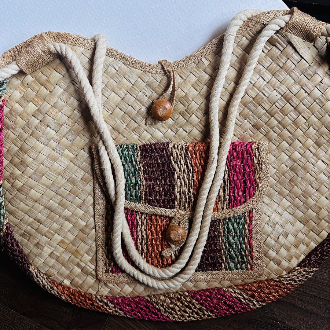 Woven Handbag with Colorful Pocket (Category: Tote Bags) located in Mandaluyong City. Submitted by TheWeekendProject (Listing ID 1429158485, Image 3). Description: - Woven banig shoulder bag - Features a colorful pocket - Made in the Philippines - Unique and stylish design - Perfect beach bag with roomy interior..