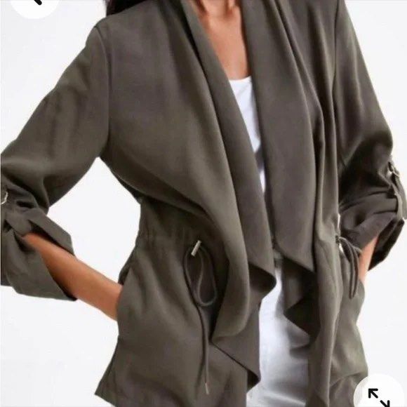 Zara Drape Front Jacket (Category: Coats, Jackets and Outerwear) located in Baliuag. Submitted by declutterbynadz (Listing ID 1429072450, Image 3). Description: Olive green jacket from Zara. Features a draped front design, adjustable sleeves with ring details, and drawstring waist. Includes two front pockets. The jacket is a size M..