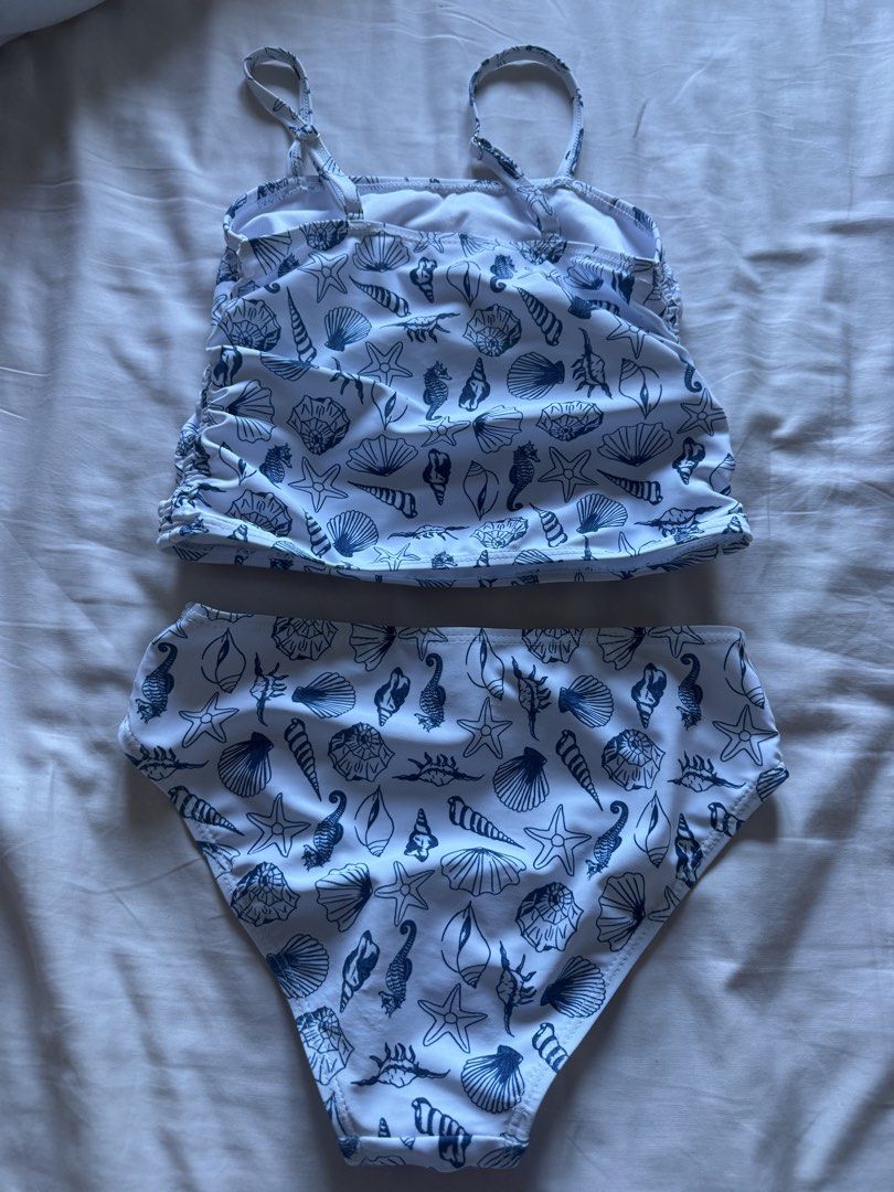 10Y Shell Print Two-Piece Swimsuit Shein (Category: Babies & Kids Fashion) located in Taguig. Submitted by macncheese (Listing ID 1424519877, Image 2). Description: 10Y Shell Print Two-Piece Swimsuit Shein Used once Good codnition .