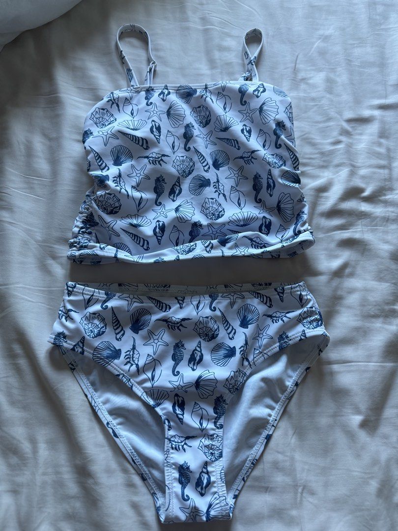 10Y Shell Print Two-Piece Swimsuit Shein (Category: Babies & Kids Fashion) located in Taguig. Submitted by macncheese (Listing ID 1424519877, Image 1). Description: 10Y Shell Print Two-Piece Swimsuit Shein Used once Good codnition .