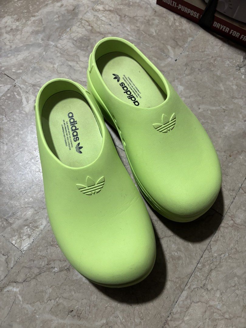 Adidas Adifom Stan Mule W - Green (Category: Sneakers) located in Bocaue. Submitted by lexaelleanac (Listing ID 1424365750, Image 2). Description: - Adidas Adifom Stan Mule W - Vibrant green color - Slip-on design - Adidas logo detail - US size 8, UK 7, EUR 40 2/3 - Model number: IE7050.