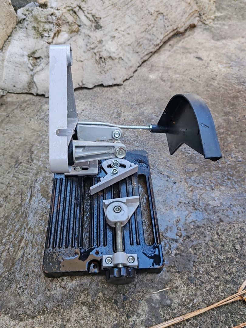Angle Grinder and Drill Stand (Category: Construction Tools & Equipment) located in General Trias. Submitted by jeromebarb07856 (Listing ID 1424500346, Image 3). Description: Angle grinder and Drill stand with a black base and a gray support structure..
