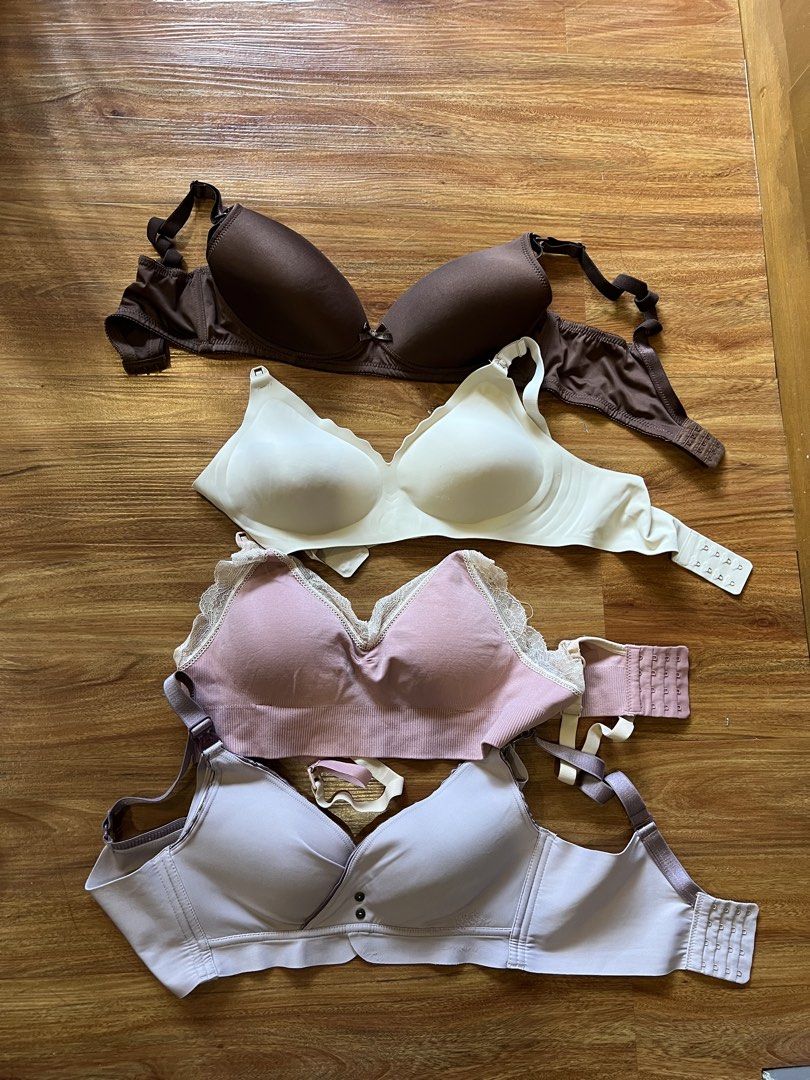 Assorted Breastfeeding Bras (Category: Breastfeeding & Bottle Feeding) located in Manila. Submitted by declutterforamari (Listing ID 1424463561, Image 1). Description: - size 34B - 2 never used just washed - 4 Assorted bras in various colors. - Includes: brown padded bra, white bra, pink lace-trimmed bra, and light purple bra. - All bras feature adjustable straps. - All bras have hook-and-eye closures. - Perfect for breastfeeding or everyday use.