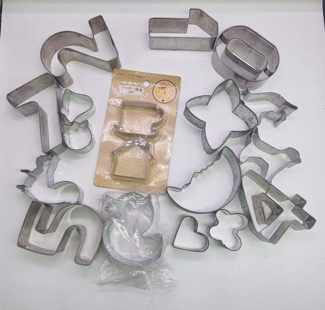 Assorted Cookie Cutter Set (Category: Bakeware) located in Marikina City. Submitted by andreah_16 (Listing ID 1424366047, Image 1). Description: Set includes various stainless steel cookie cutters in different shapes, including letters, numbers, and other fun designs. It also includes a set of cutters still in their original packaging. Perfect for baking cookies, pastries, or even crafting with playdough. Great for both beginners and experienced 