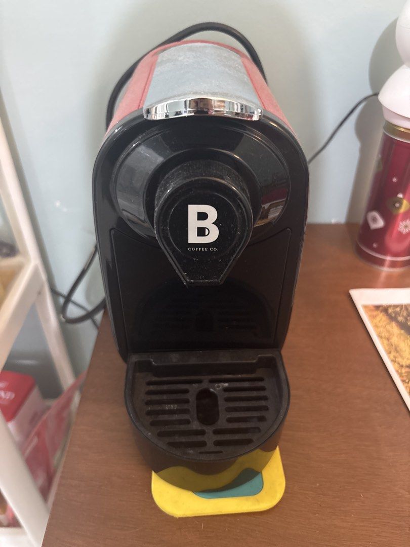 B Coffee Co. Coffee Machine (Category: Coffee Machines & Makers) located in Cabuyao City. Submitted by abcducao (Listing ID 1424375642, Image 1). Description: - B Coffee Co. coffee machine - Red and black design with chrome accent - Includes drip tray - Comes with power cord - In good working condition.