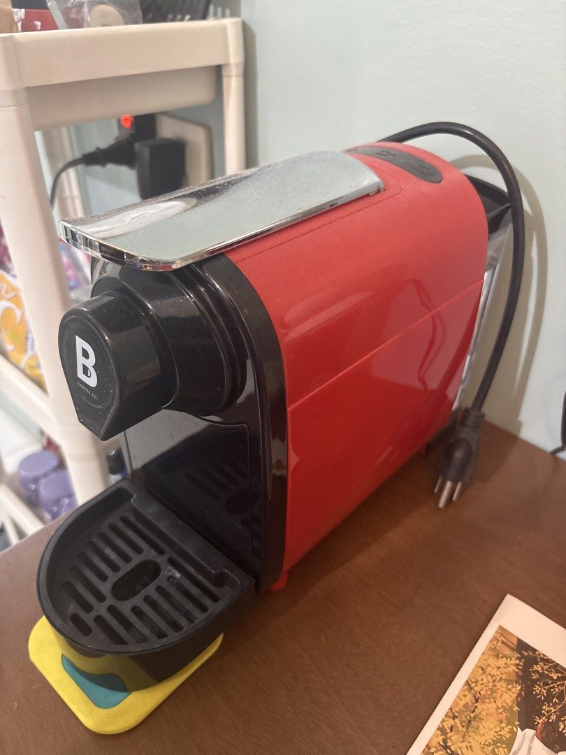 B Coffee Co. Coffee Machine (Category: Coffee Machines & Makers) located in Cabuyao City. Submitted by abcducao (Listing ID 1424375642, Image 2). Description: - B Coffee Co. coffee machine - Red and black design with chrome accent - Includes drip tray - Comes with power cord - In good working condition.
