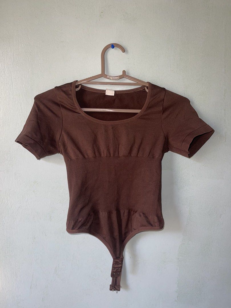 black and brown shapewear bodysuit (Category: Others Tops) located in Manila. Submitted by declutterwithbea (Listing ID 1424424028, Image 3). Description: xxs-xs bust: 20.5” waist: 19.7” hip: 21.3 black has small hole in neck area, just needs stitching.
