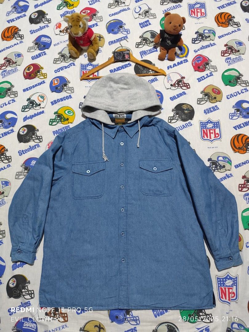 Boulder Creek Hooded Denim Jacket XL (Category: Coats, Jackets and Outerwear) located in Baguio. Submitted by FRANKLIN (Listing ID 1424505507, Image 1). Description: Boulder Creek denim jacket with a gray hood. Features a button-down front, two chest pockets, and a quilted black lining. The jacket is an XL size. The buttons are branded with "Boulder Creek". The jacket has a drawstring on the hood..