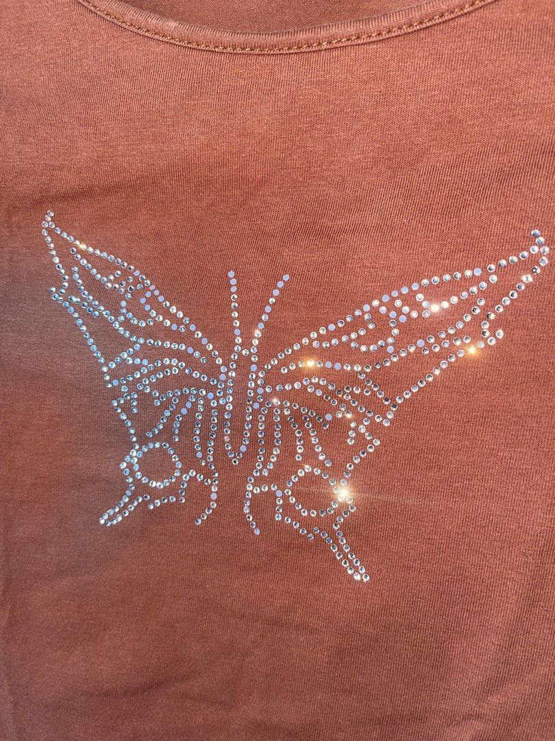 brown butterfly rhinestone cropped top (Category: Shirts) located in Manila. Submitted by declutterwithbea (Listing ID 1424422395, Image 2). Description: soft material v presko! length: 15” width: 16.5”.