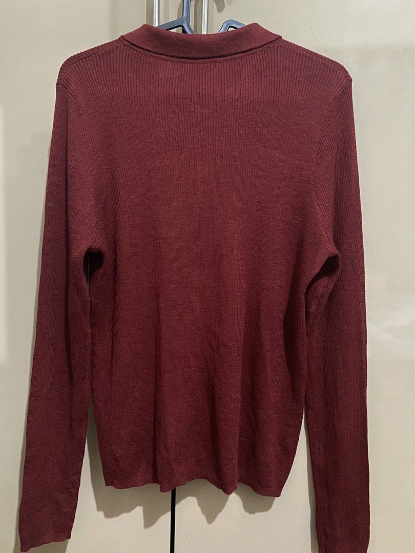 Burgundy/Maroon Collared Cardigan (Category: Coats, Jackets and Outerwear) located in Taguig. Submitted by jaebae_ (Listing ID 1424325080, Image 3). Description: - Maroon cardigan - Collared neckline - Button-down closure - Embroidered design on front - Long sleeves - Ribbed texture - Plain back - Knit material.