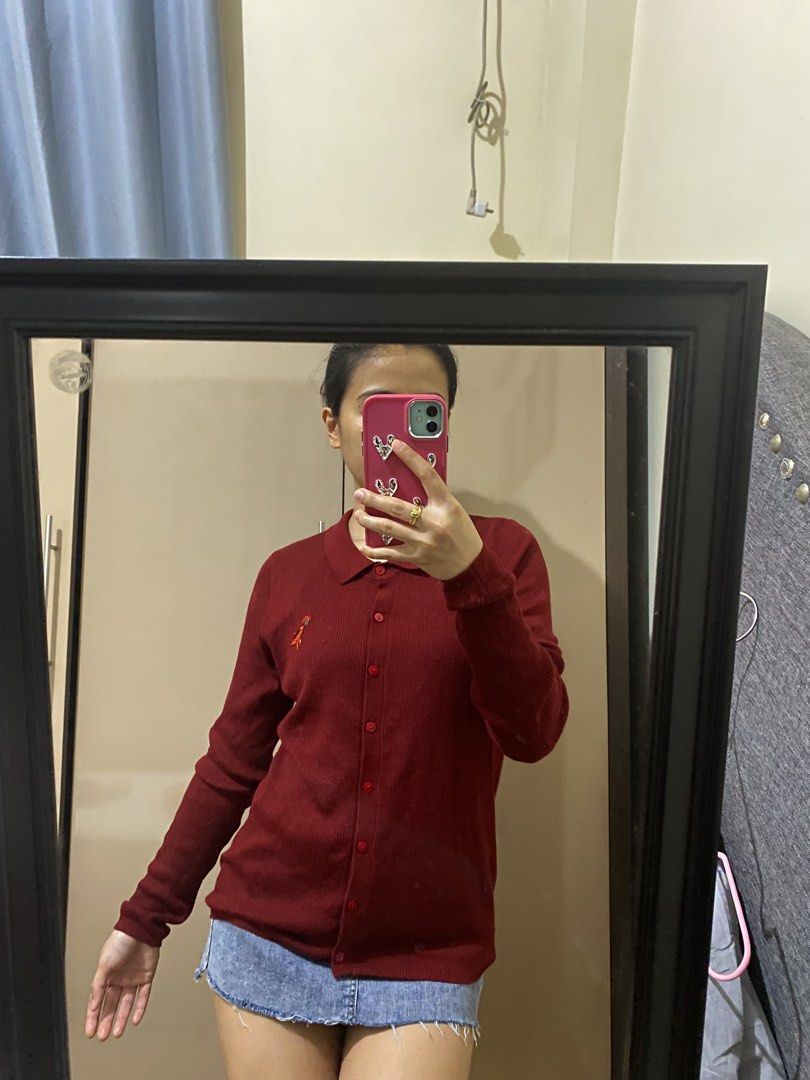 Burgundy/Maroon Collared Cardigan (Category: Coats, Jackets and Outerwear) located in Taguig. Submitted by jaebae_ (Listing ID 1424325080, Image 2). Description: - Maroon cardigan - Collared neckline - Button-down closure - Embroidered design on front - Long sleeves - Ribbed texture - Plain back - Knit material.